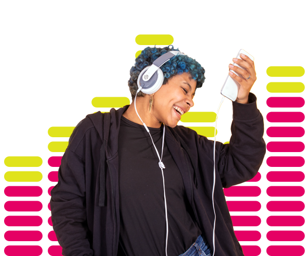 Girl dancing to music on phone with headphones